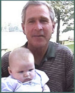 President George W Bush with adoptive baby